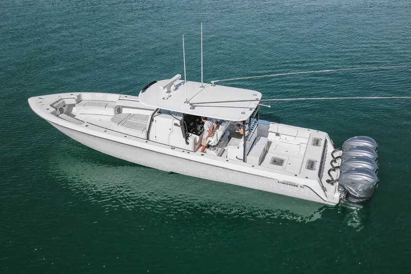 Slide: The Image of 2023 Contender 44 ST boat with quad engines on clear water. - 14