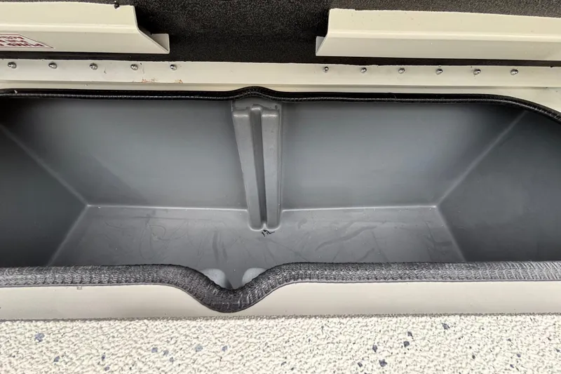 Slide: The Image of Empty storage compartment in 2027 Ranger RB200 boat, featuring durable interior design. - 14