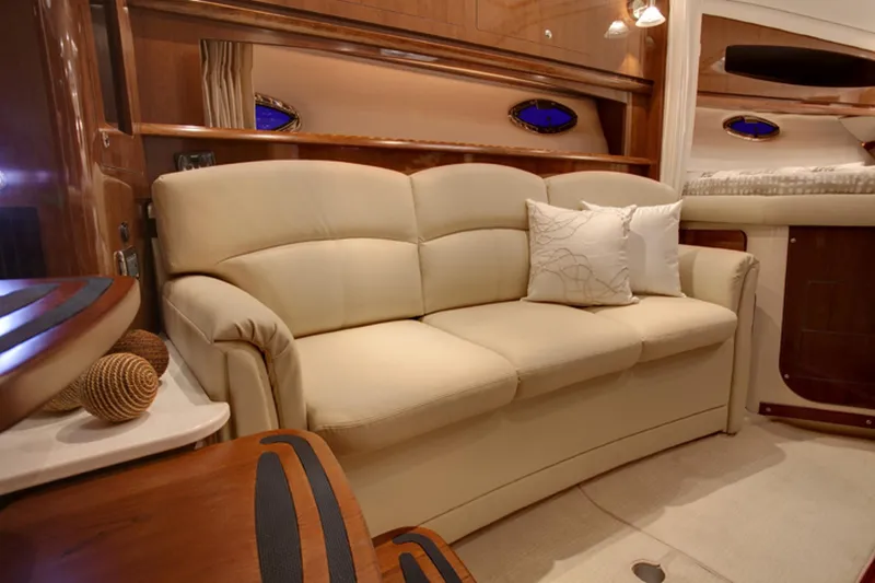 Slide: The Image of Manufacturer Provided Image: Luxurious interior of 2016 Four Winns V335 yacht with beige leather sofa. - 8