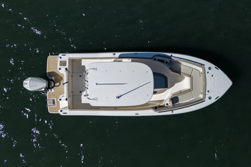 Slide: The Image of Overhead view of 2024 Scout 240 XSF boat on water. - 4