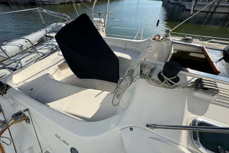 Slide: The Image of 2007 Hunter 41 Deck Salon yacht cockpit with seating and nautical equipment. - 1