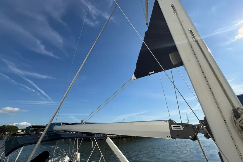 Slide: The Image of Sailboat mast and rigging of 2007 Hunter 41 Deck Salon under clear blue sky. - 11