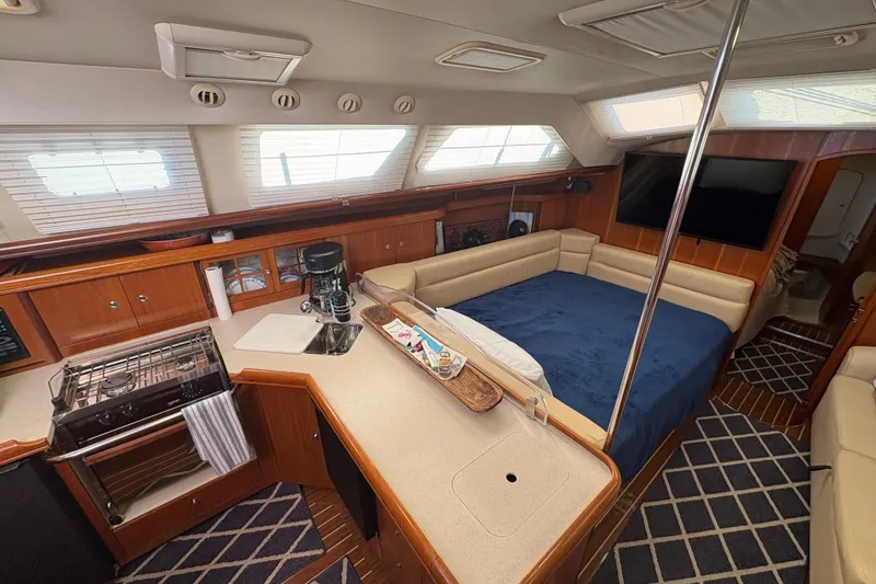Slide: The Image of Luxurious interior of 2007 Hunter 41 Deck Salon yacht with modern amenities. - 17