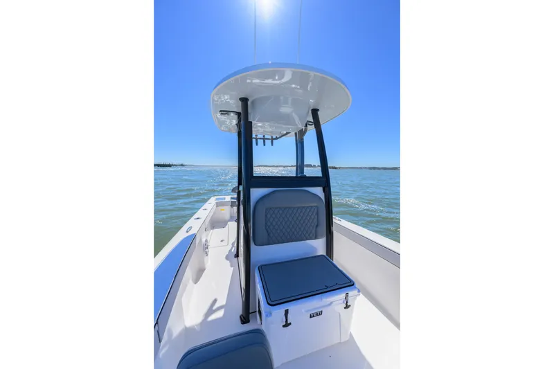 Slide: The Image of 2025 Delta Boatworks D245 on water, featuring sleek design and comfortable seating. - 14