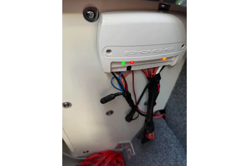 Slide: The Image of Control panel with wiring in a 2026 Ymaha 255 boat, featuring indicator lights. - 10