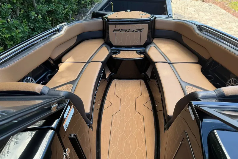 Slide: The Image of Luxurious interior of 2026 Ymaha 255 boat with tan seating and sleek design. - 6