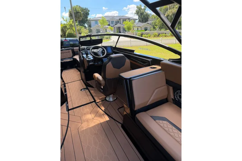 Slide: The Image of Interior of 2026 Ymaha 255 boat with sleek design and modern seating. - 15