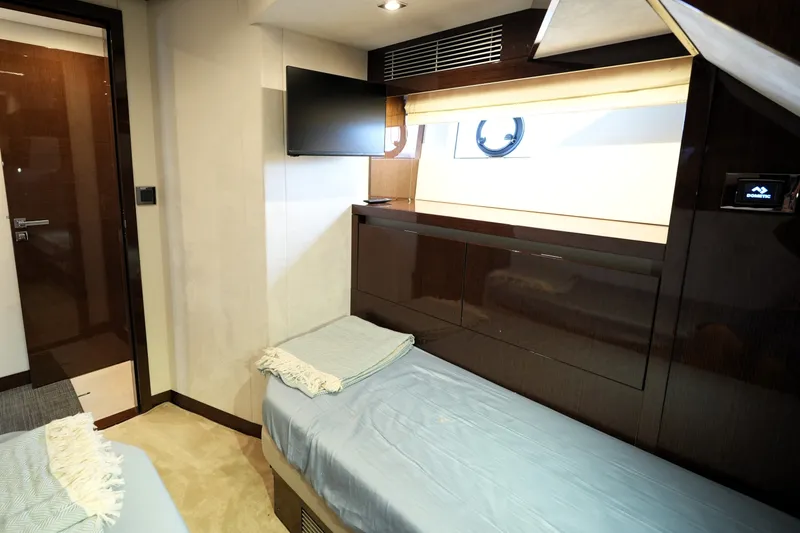 Slide: The Image of Luxurious cabin interior of 2023 Prestige 690 yacht with modern amenities and sleek design. - 121