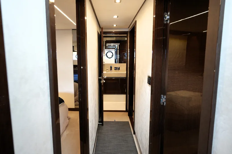 Slide: The Image of Luxurious interior hallway of 2023 Prestige 690 yacht, featuring sleek design and modern finishes. - 103