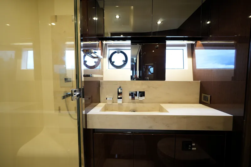 Slide: The Image of Luxurious bathroom interior of 2023 Prestige 690 yacht with modern fixtures and elegant design. - 122