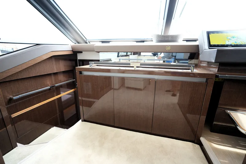 Slide: The Image of Luxurious interior of 2023 Prestige 690 yacht with sleek wood finishes and modern design. - 72