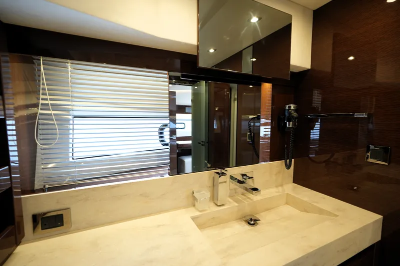 Slide: The Image of Luxurious bathroom interior of 2023 Prestige 690 yacht with modern fixtures and elegant design. - 99