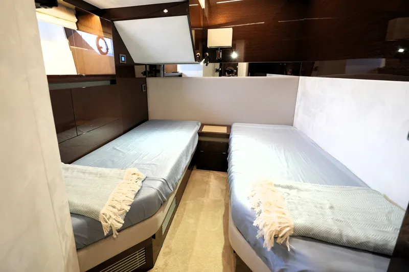 Slide: The Image of Luxurious twin cabin interior of 2023 Prestige 690 yacht with modern design. - 118