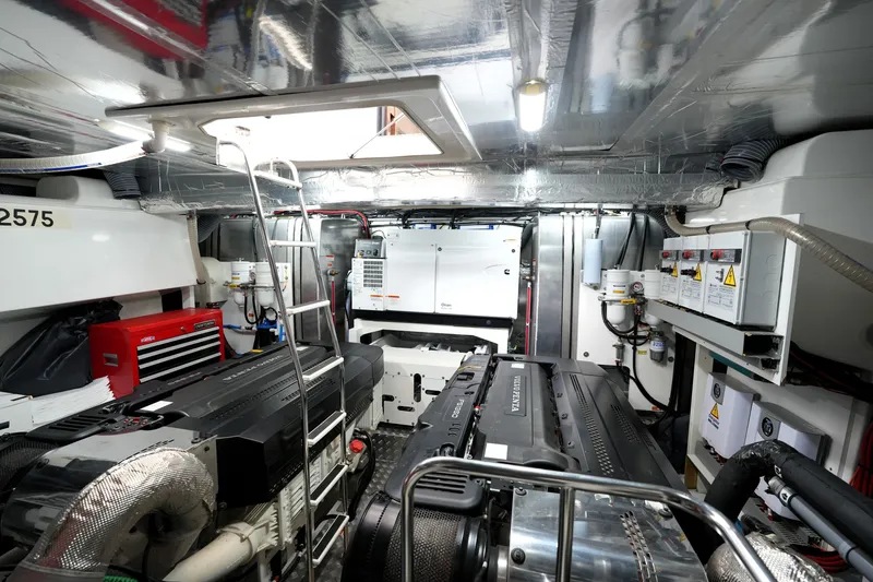 Slide: The Image of Engine room of 2023 Prestige 690 yacht, featuring advanced machinery and equipment. - 124