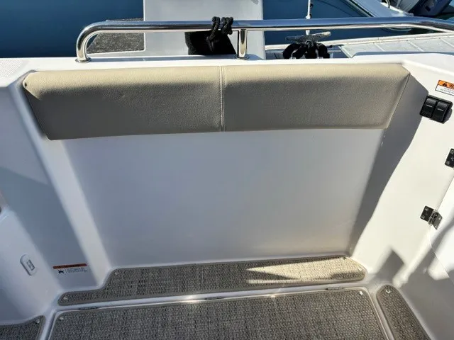 Slide: The Image of The image shows the cockpit of a 2026 Cutwater C-248 Coupe with padded seating and stainless steel railing. - 23