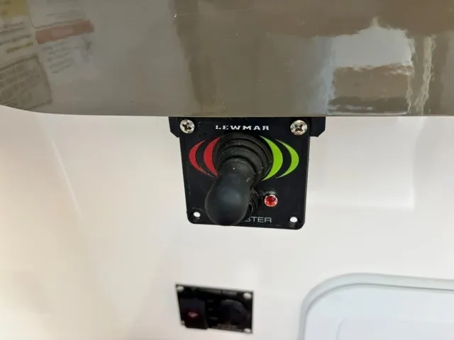Slide: The Image of Close-up of a Lewmar control panel with joystick on a Cutwater C-248 Coupe boat. - 35