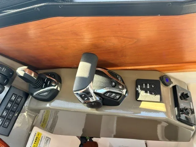 Slide: The Image of Close-up of a Cutwater C-248 Coupe helm with modern controls. - 33