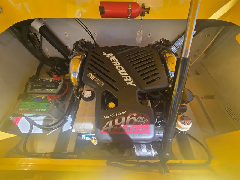 Slide: The Image of The engine compartment of a 2007 Baja 26 Outlaw features a Mercury MerCruiser 496 Mag HO engine. - 15