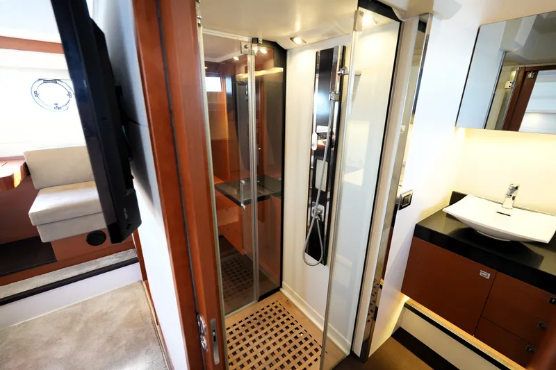 Slide: The Image of Luxurious bathroom interior of 2016 Prestige 550 yacht with modern shower and sink. - 84