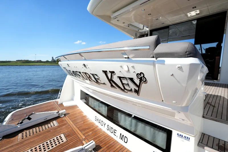 Slide: The Image of Luxury yacht Prestige 550, 2016 model, docked with "Pleasure Key" nameplate, Shady Side, MD. - 14