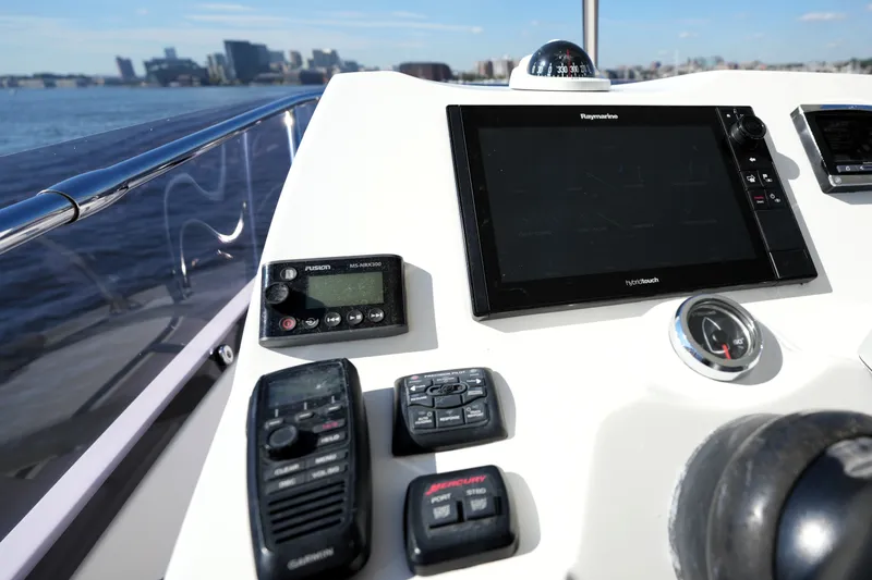 Slide: The Image of Control panel of a 2016 Prestige 550 yacht with navigation equipment. - 34