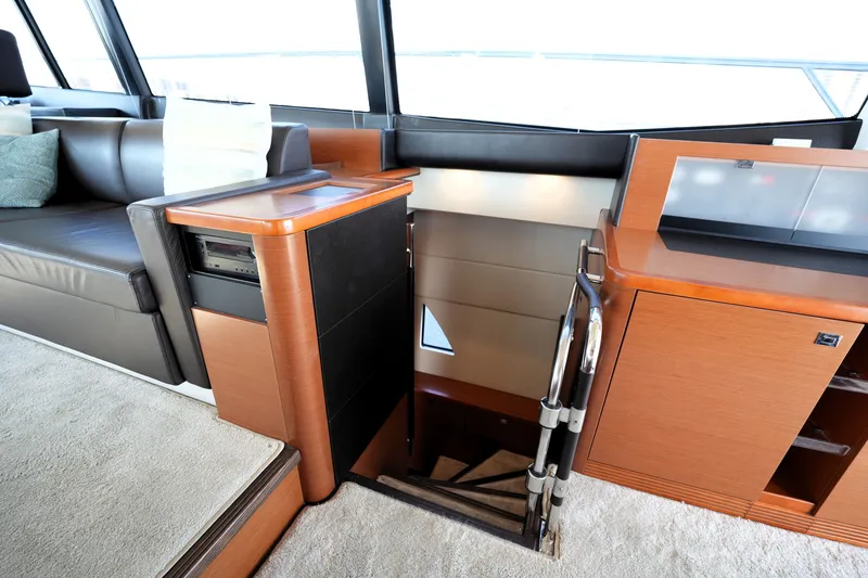 Slide: The Image of Luxurious interior of 2016 Prestige 550 yacht with elegant wood finishes and modern design. - 73