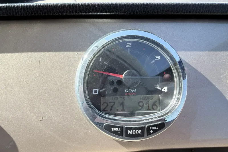 Slide: The Image of RPM gauge of a 2016 Prestige 550 boat, showing 27.1 volts and 916 hours. - 72