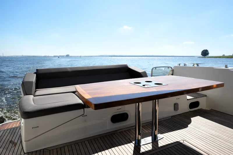 Slide: The Image of Luxury seating area on 2016 Prestige 550 yacht with ocean view. - 16