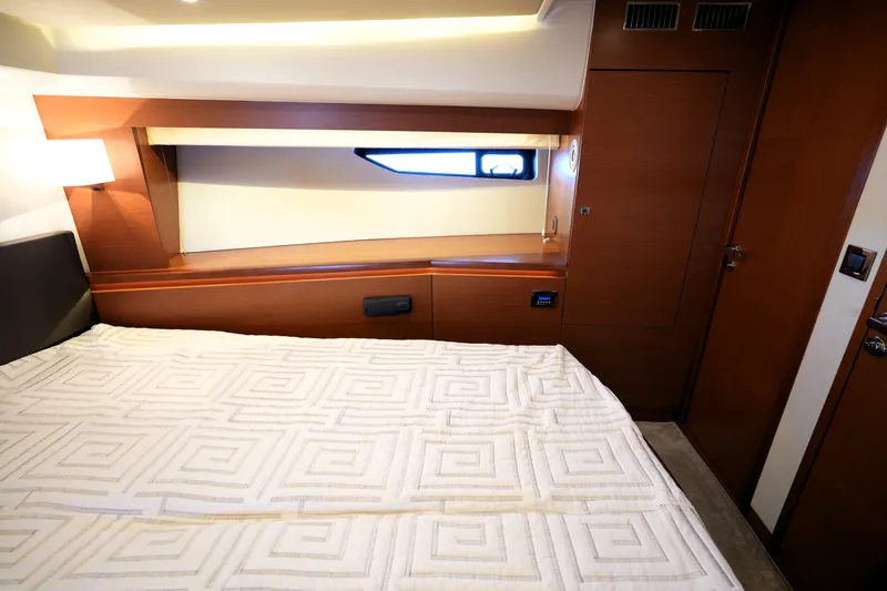 Slide: The Image of Luxurious cabin interior of 2016 Prestige 550 yacht with elegant wood finish. - 92