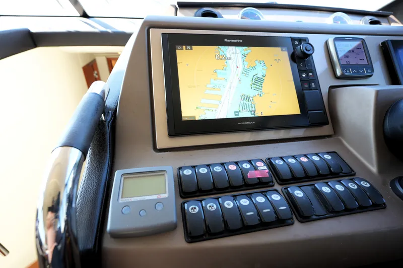 Slide: The Image of Control panel of a 2016 Prestige 550 yacht with navigation display. - 67