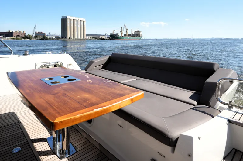 Slide: The Image of Luxury seating area on 2016 Prestige 550 yacht with ocean view. - 17