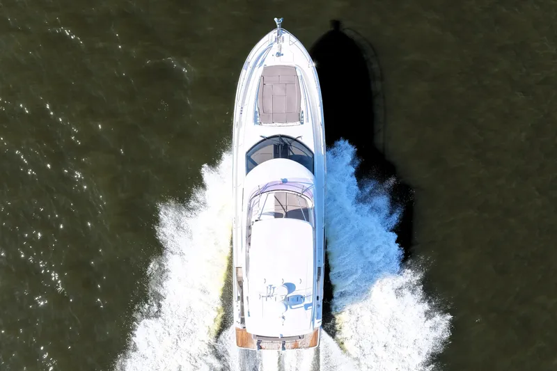 Slide: The Image of Aerial view of 2016 Prestige 550 yacht cruising on water. - 11