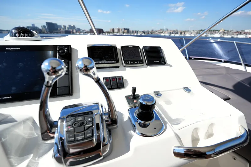 Slide: The Image of Control panel of a 2016 Prestige 550 yacht with navigation equipment. - 36