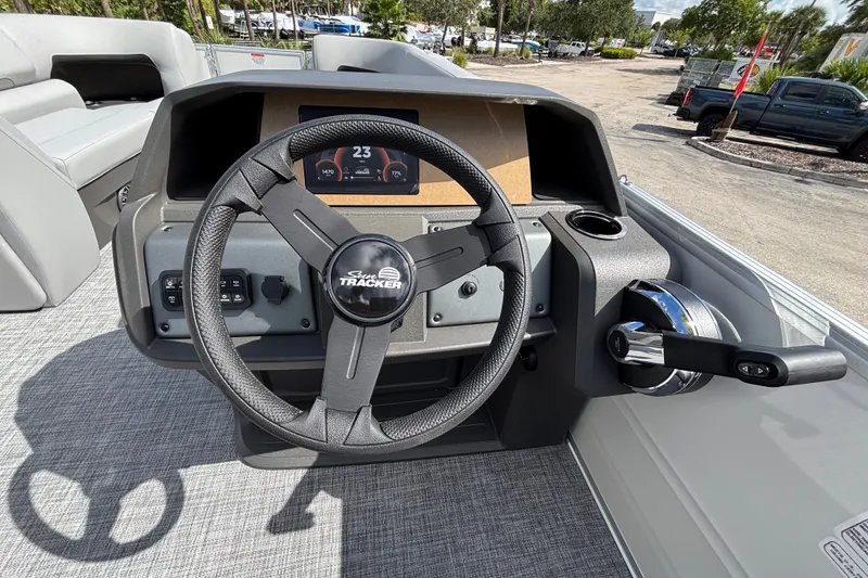 Slide: The Image of Steering console of 2027 Sun Tracker Party Barge 20 DLX pontoon boat. - 15