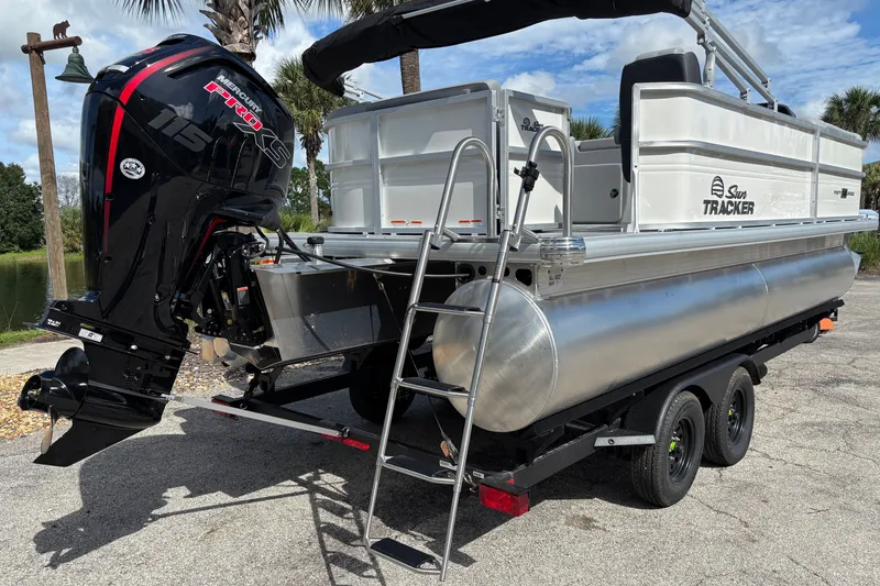 The Image of 2027 Sun Tracker Party Barge 20 DLX pontoon boat with Mercury 115 Pro XS engine. - 0