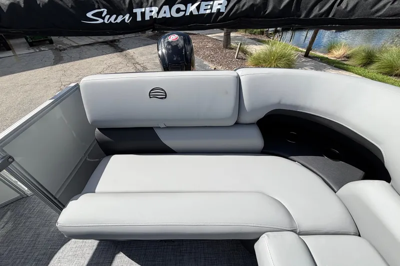 Slide: The Image of 2027 Sun Tracker Party Barge 20 DLX with comfortable seating and sleek design. - 16