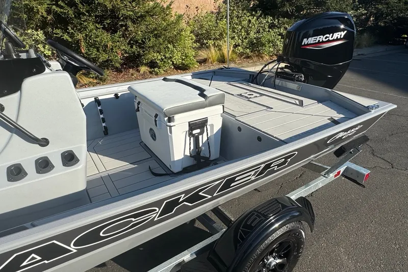 Slide: The Image of 2027 Tracker Bass Tracker Classic CC boat with Mercury engine on trailer. - 13