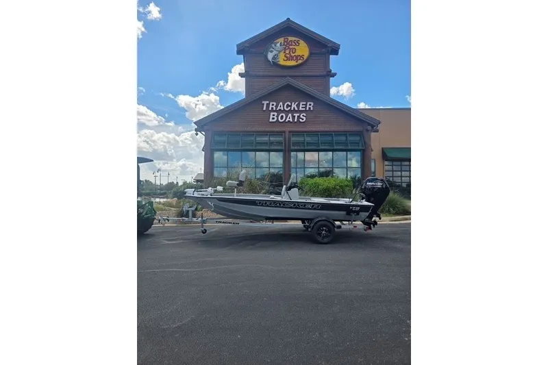 Slide: The Image of 2027 Tracker Bass Tracker 175 CC boat displayed outside Bass Pro Shops. - 13