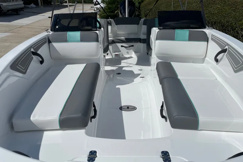 Slide: The Image of Interior of a 2027 Tahoe T21 boat with sleek seating and modern design. - 17