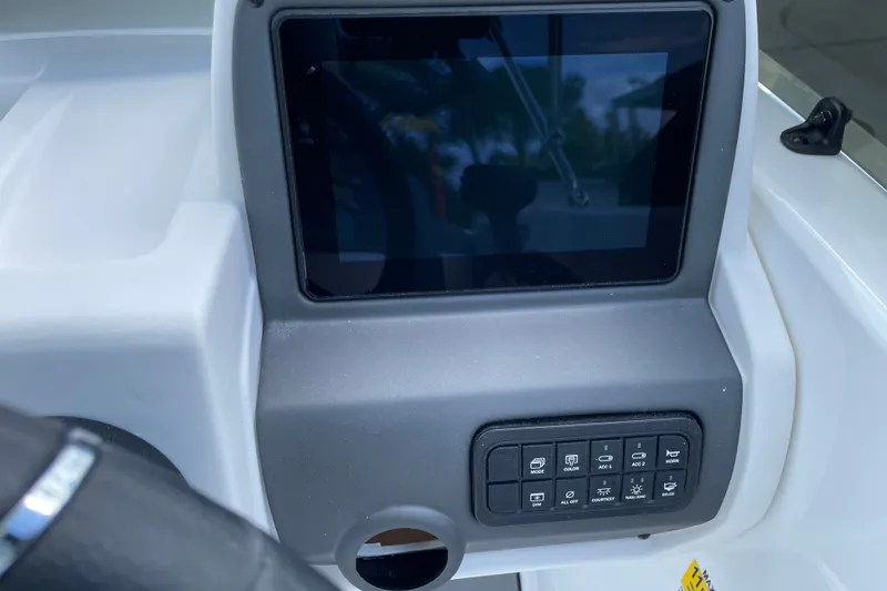 Slide: The Image of Dashboard of 2027 Tahoe T21 boat with touchscreen and control panel. - 12