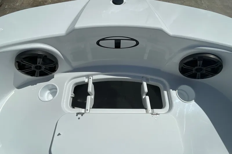 Slide: The Image of 2027 Tahoe T21 boat interior with speakers and storage compartment. - 23