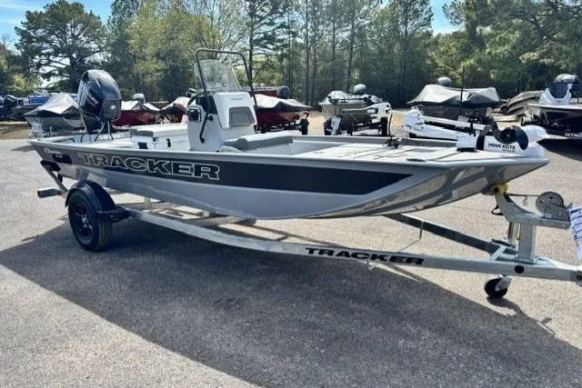 The Image of 2027 Tracker Bass Tracker Classic CC boat on trailer in outdoor lot. - 0