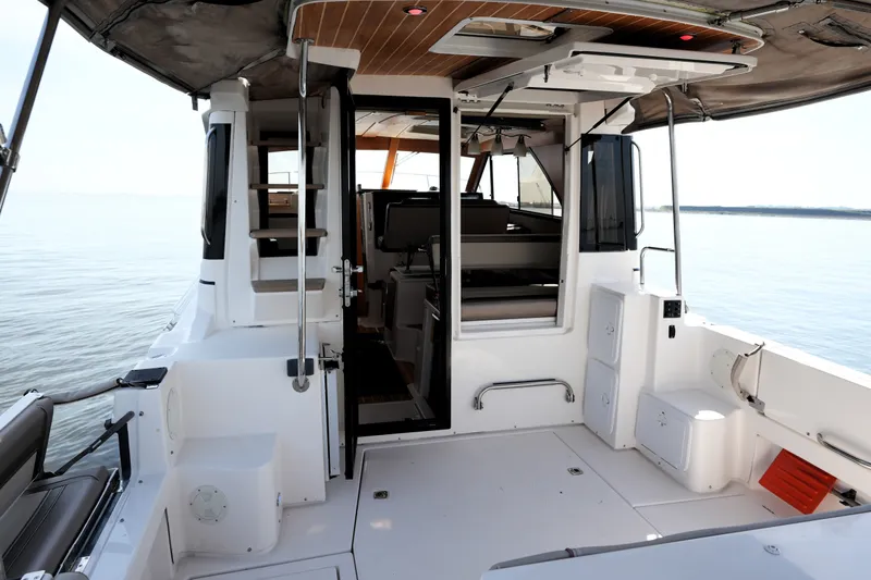 Slide: The Image of 2021 Cutwater C-32 CB boat interior with open cabin and seating area. - 22
