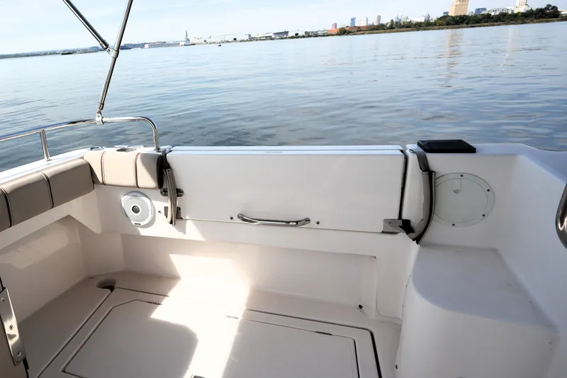 Slide: The Image of 2021 Cutwater C-32 CB boat deck with water view and city skyline. - 19