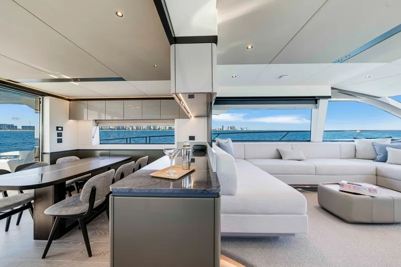 Slide: The Image of Luxurious salon of the Sunseeker Manhattan 68 with modern design, large windows, and stylish furnishings. - 20