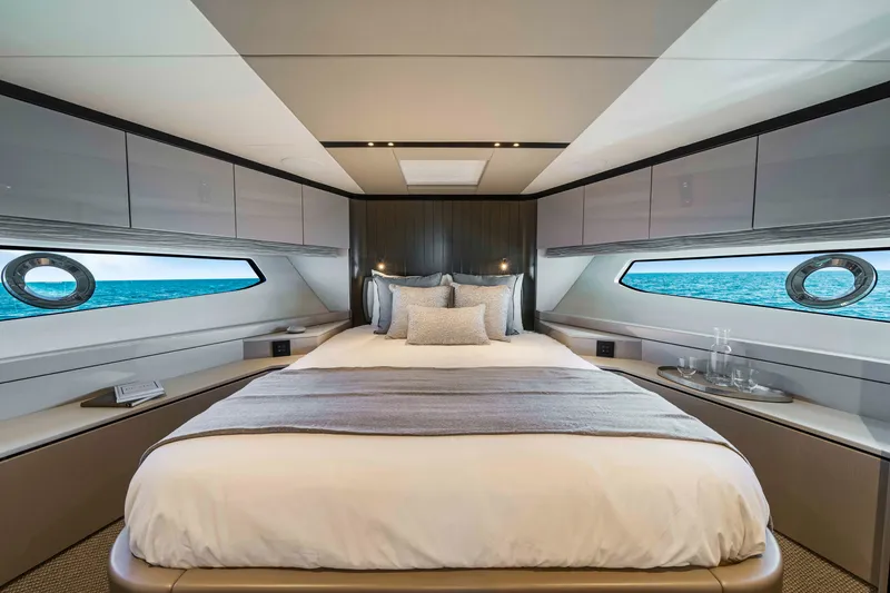 Slide: The Image of Luxurious cabin of the Sunseeker Manhattan 68 with a large bed and ocean views. - 31