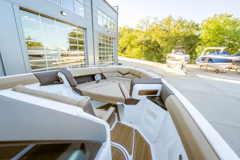 Slide: The Image of Luxurious 2027 Monterey Elite 30 OB boat interior with plush seating and modern design. - 34