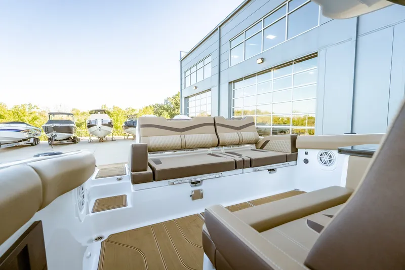 Slide: The Image of 2027 Monterey Elite 30 OB boat interior with luxurious seating and modern design. - 25