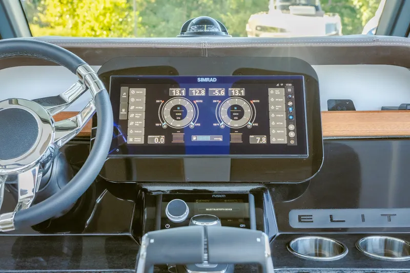Slide: The Image of Dashboard of 2027 Monterey Elite 30 OB boat with advanced navigation display. - 29