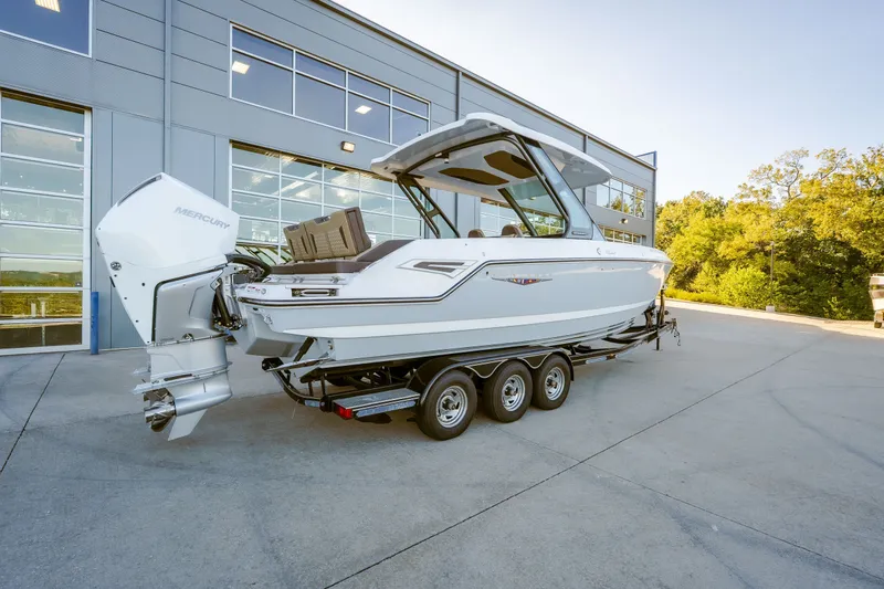 Slide: The Image of 2027 Monterey Elite 30 OB boat with Mercury outboard engine on trailer. - 15